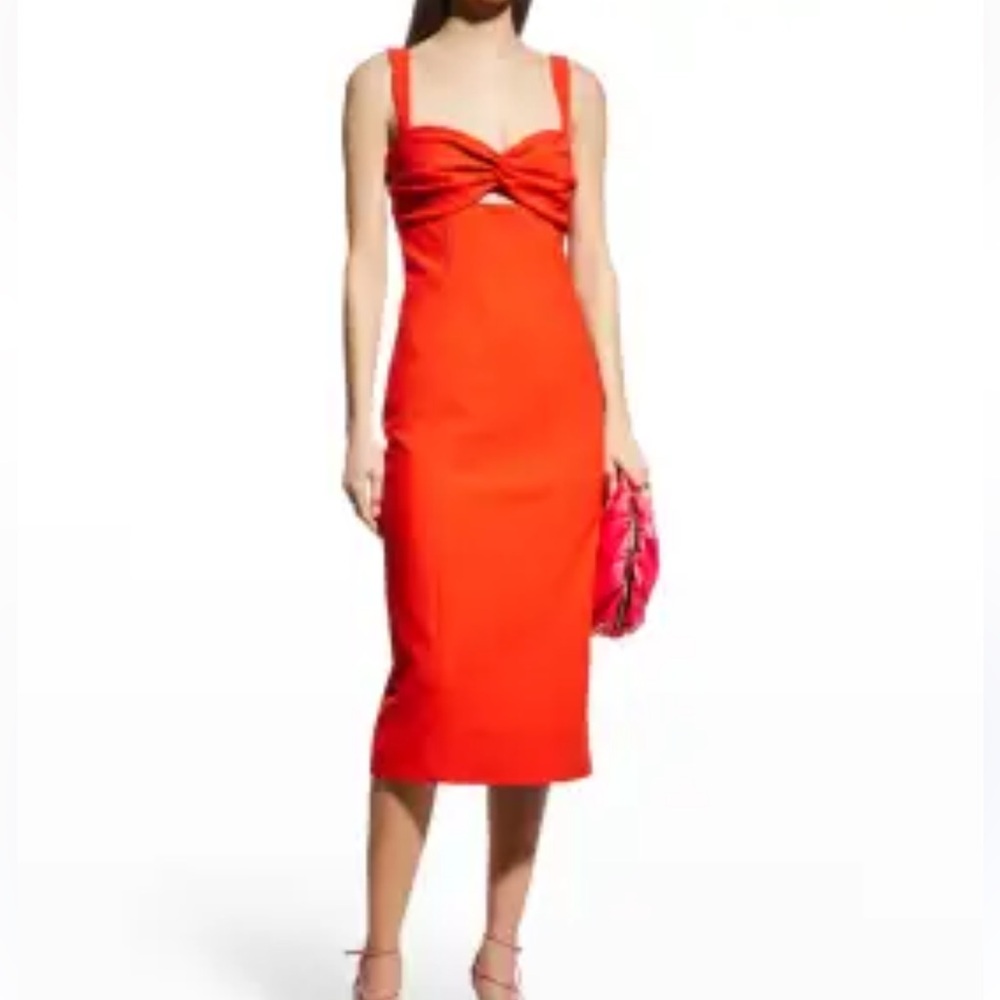 Beautiful orange dress with cross ties at the breast. Worn once.